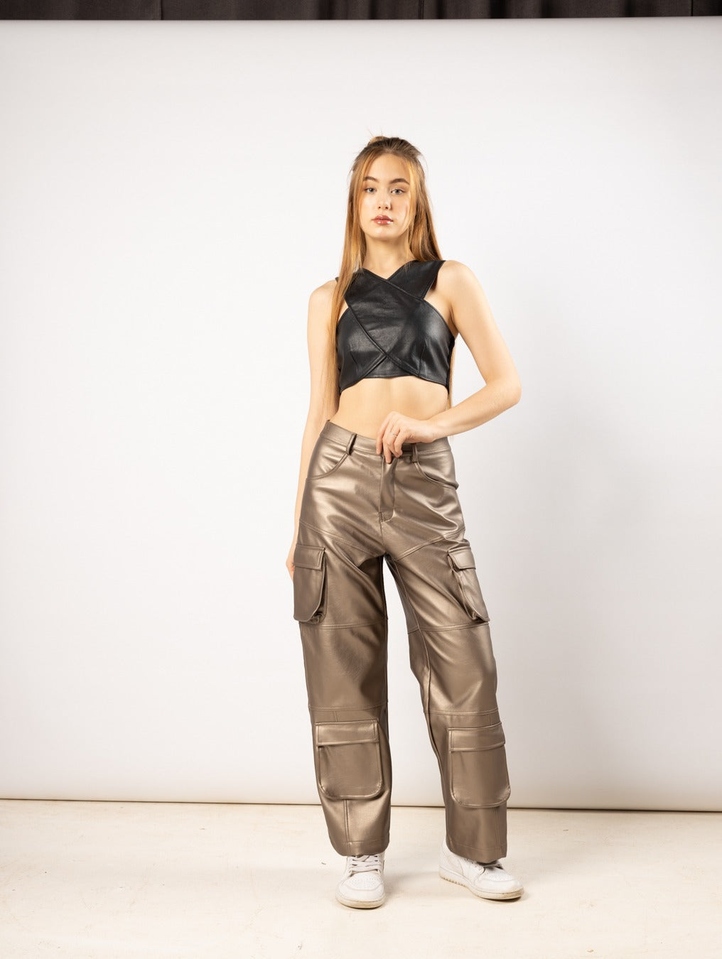 Topstitched gold leather trousers