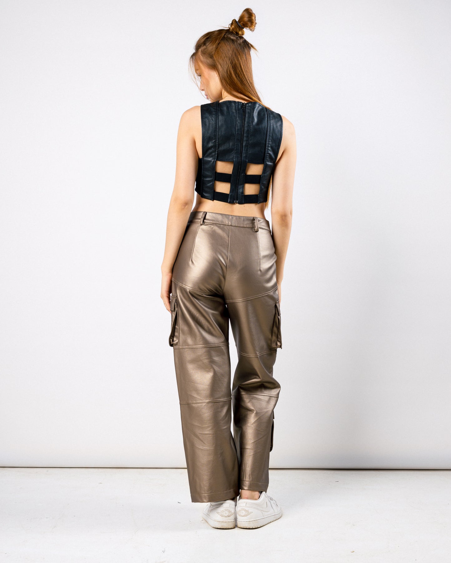 Topstitched gold leather trousers